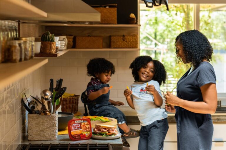 A mom and her two kids in their kitchen