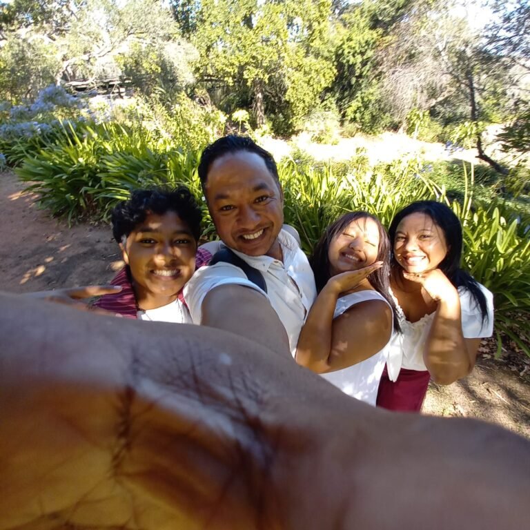 Happy Family in sunny garden