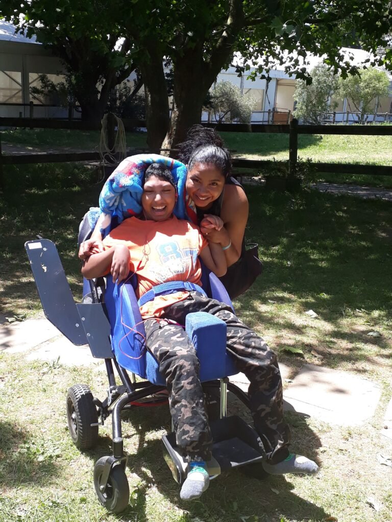Loving parent supporting a child with special needs