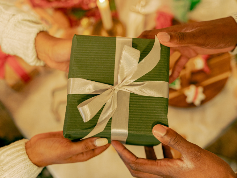 Family exchanging thoughtful gifts during a special celebration.
