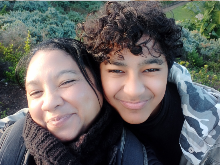 Mother and son spending time together chatting about teen challenges